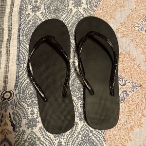 Size 9- black flip flopsps with glittered strap